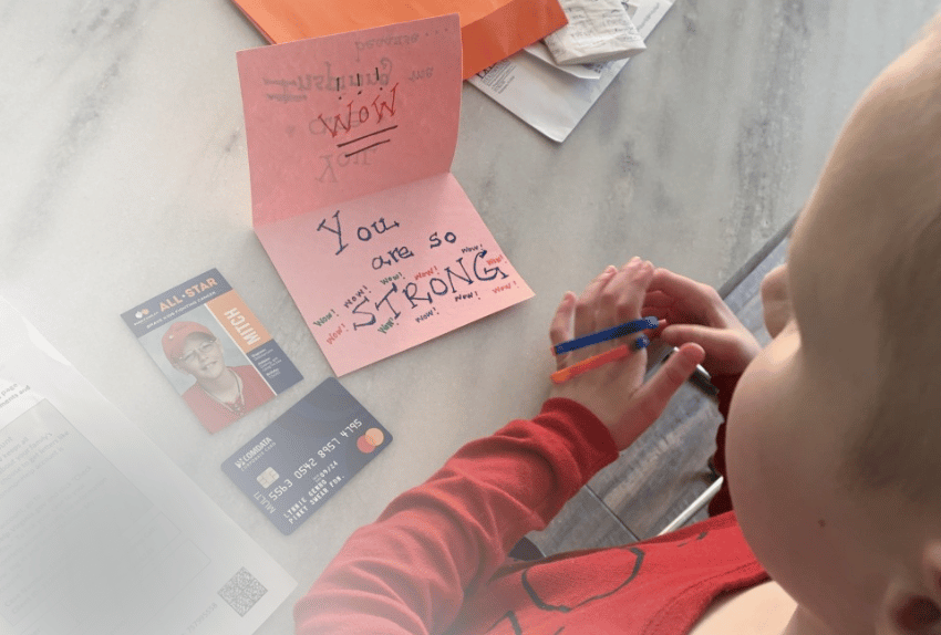 Anne with her letters of encouragement and orange envelope