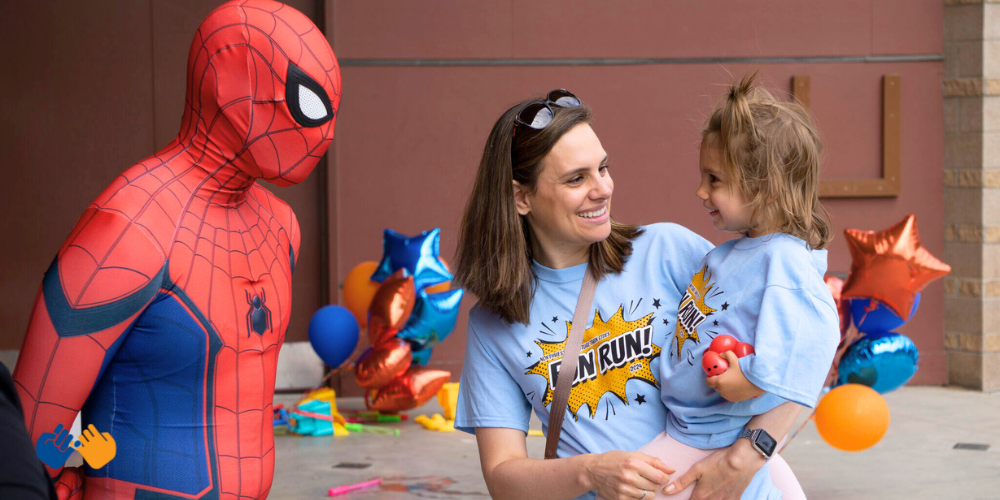 Northwestern Mutual Twin Cities hosted a Fun Run to raise money for Pinky Swear Foundation featuring characters like Spiderman for the kids!