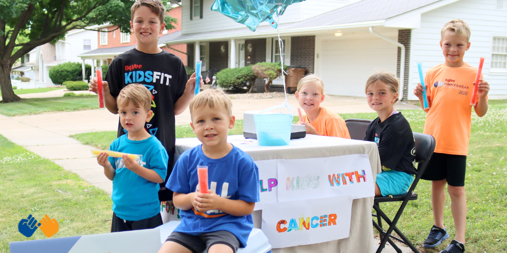 A family hosting Popsicles for Pinky Swear to raise money to help kids with cancer and their families.