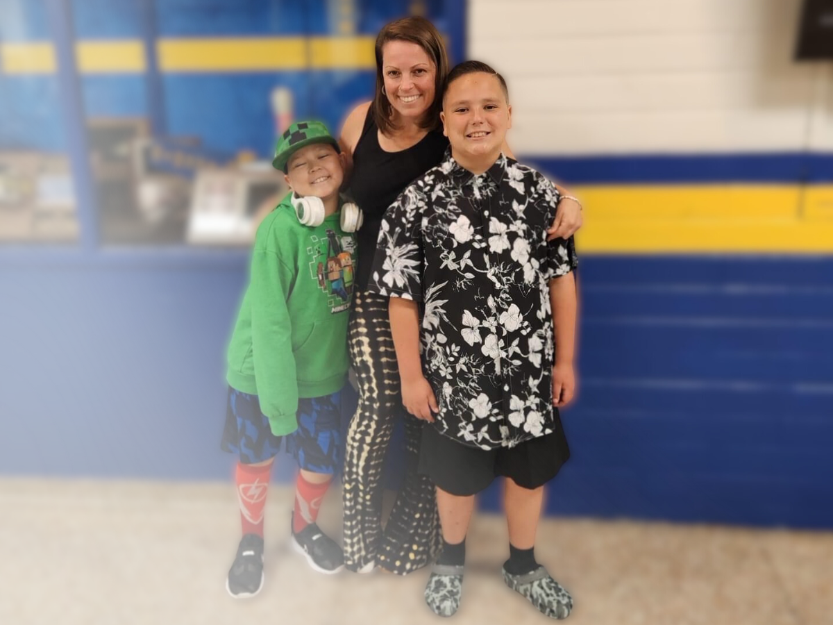 Tenzin, mom and brother at school